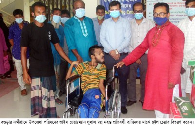 নন্দীগ্রামে উপজেলা ভাইস চেয়ারম্যানের হুইল চেয়ার ও রিংপাইপ বিতরণ